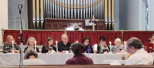 Joy reading at the Good Friday service